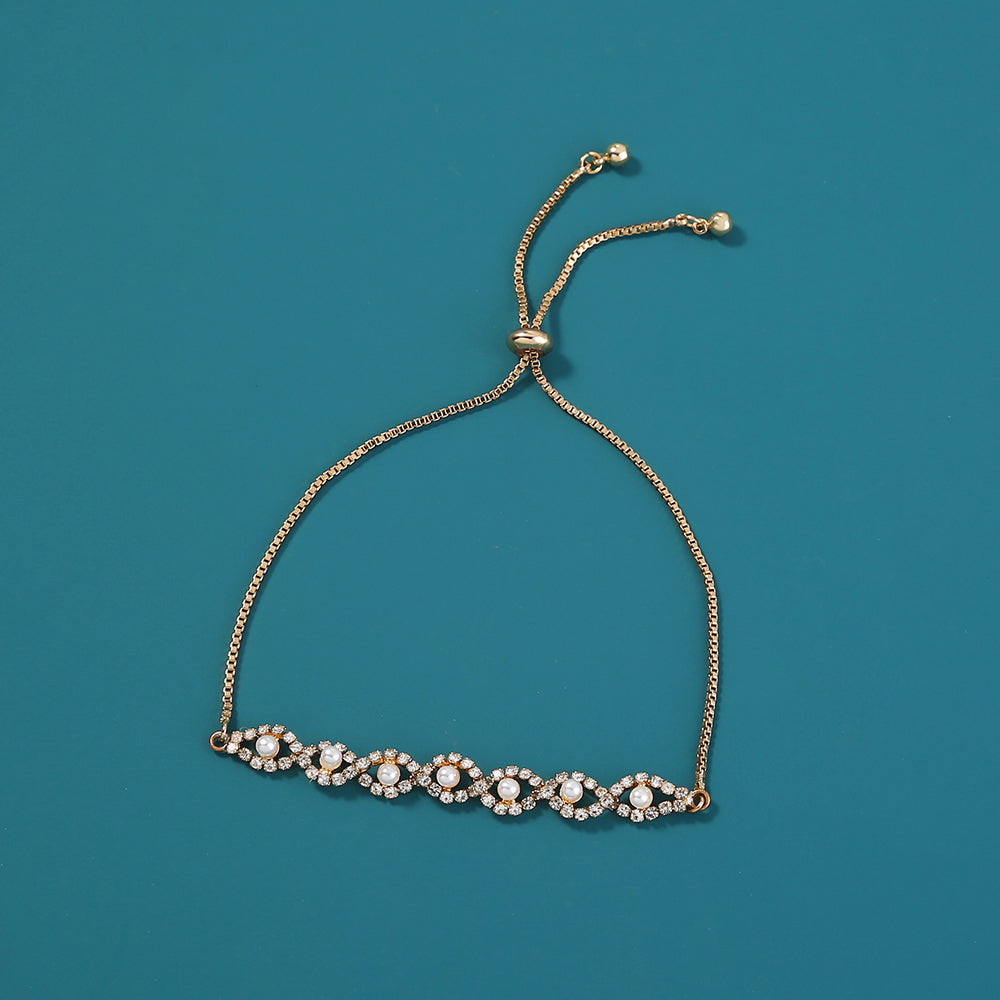 Wave Cross Pearl & Zicron Bracelet